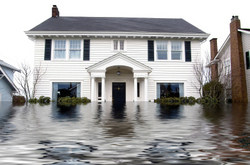 Photo-of-house-under-several-feet-of-graphically-rendered-flood-waters.jpg