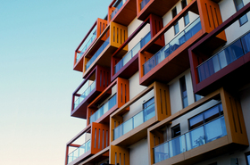 Balconies-of-a-modern-luxury-apartments-with-a-blue-sky.jpg
