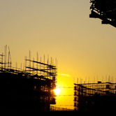 commercial-construction-cranes-sunset-wpcki.jpg