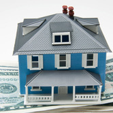 Home-value-house-on-money-stack-nki.jpg