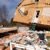 damaged-home-natural-disaster-nki.jpg