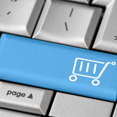 E-commerce-online-shopping-keyboard-blue-shopping-cart-button-nki.jpg